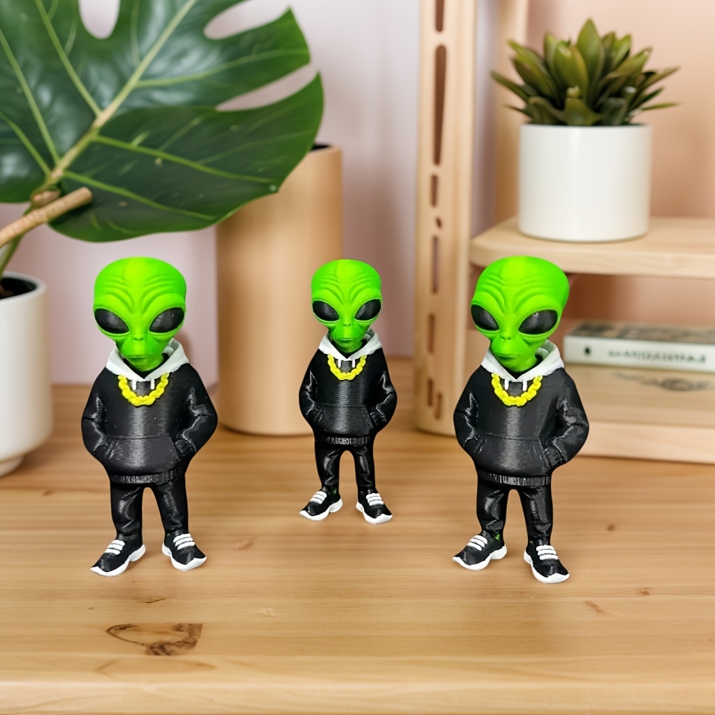 1 sztuka zielonej figurki kosm – Desk Setup Design recenzja i cena