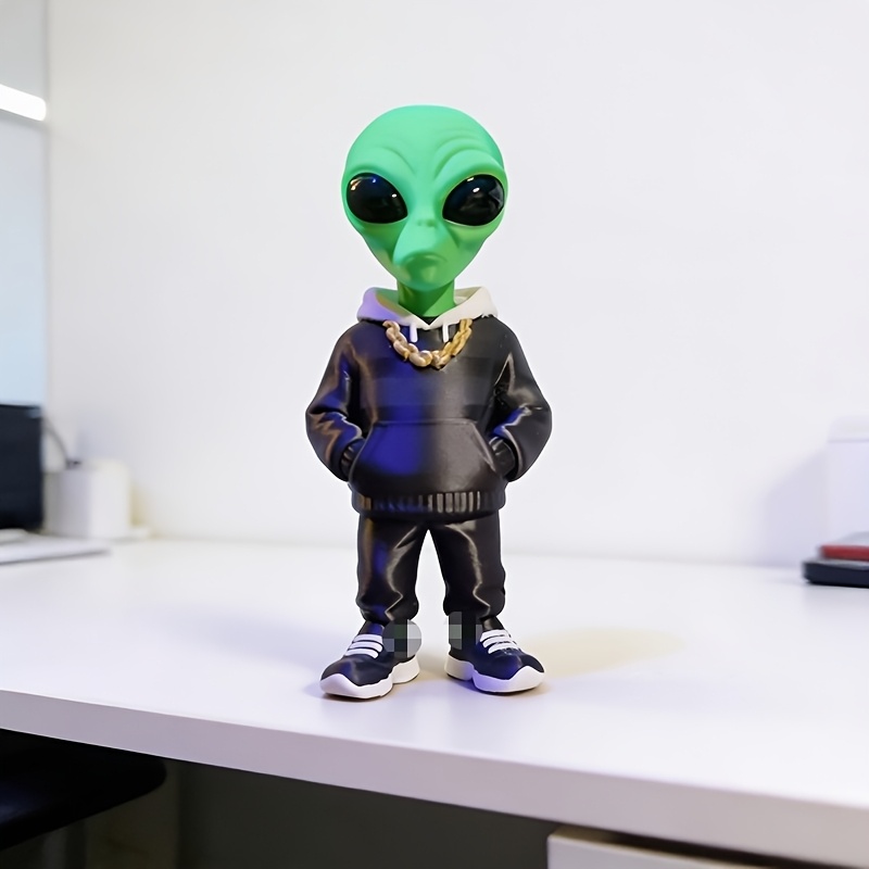 1 sztuka zielonej figurki kosm – Desk Setup Design recenzja i cena